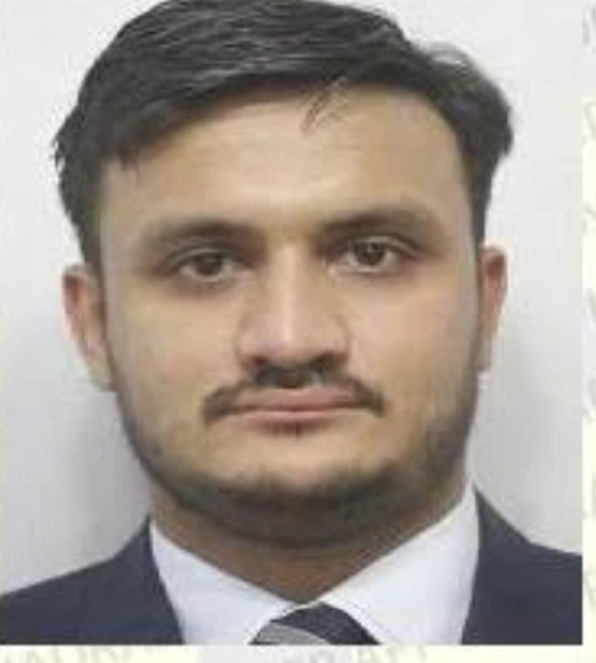 Portrait of Major Rehan Rasheed in a suit and tie.