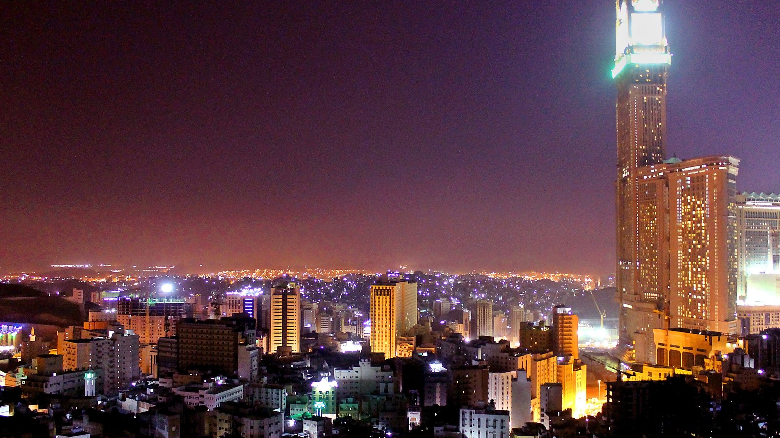 A night view of Mecca, where the three governments signed the agreement.