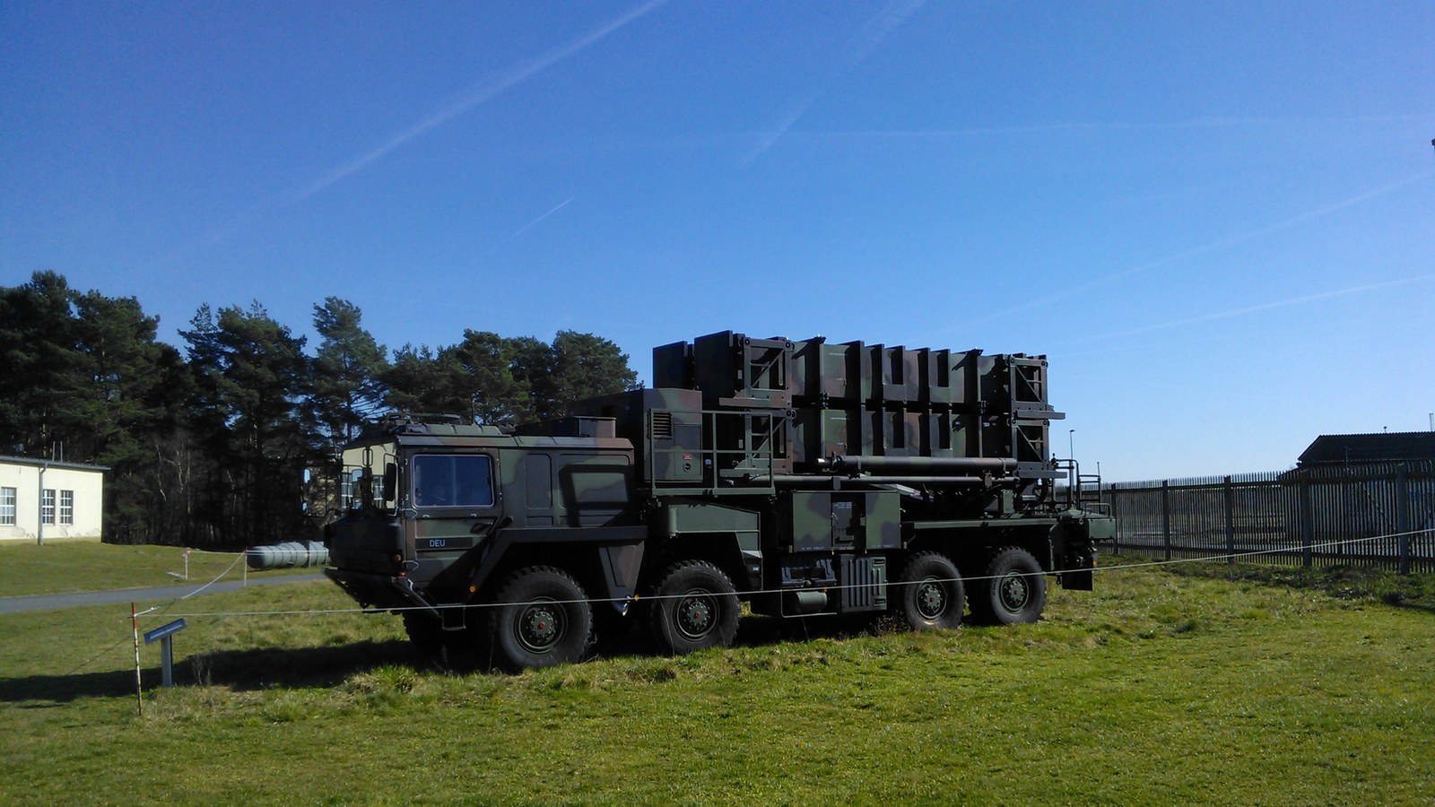 A Patriot air-defence launcher raised on its trailer at a military site.