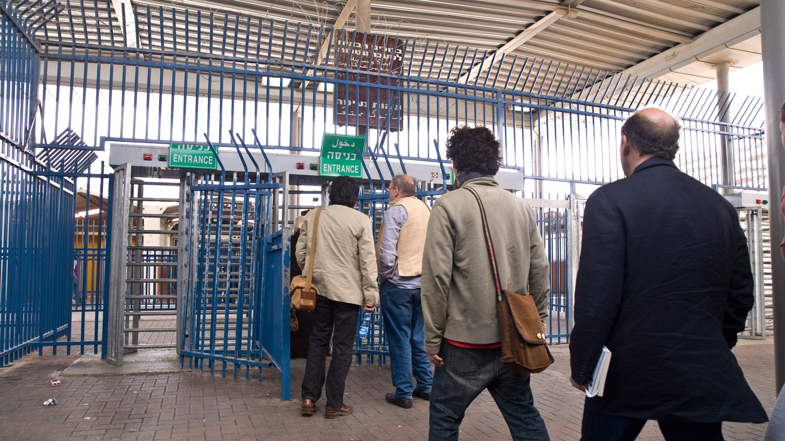 People passing through the Qalandia crossing between Jerusalem and Ramallah.