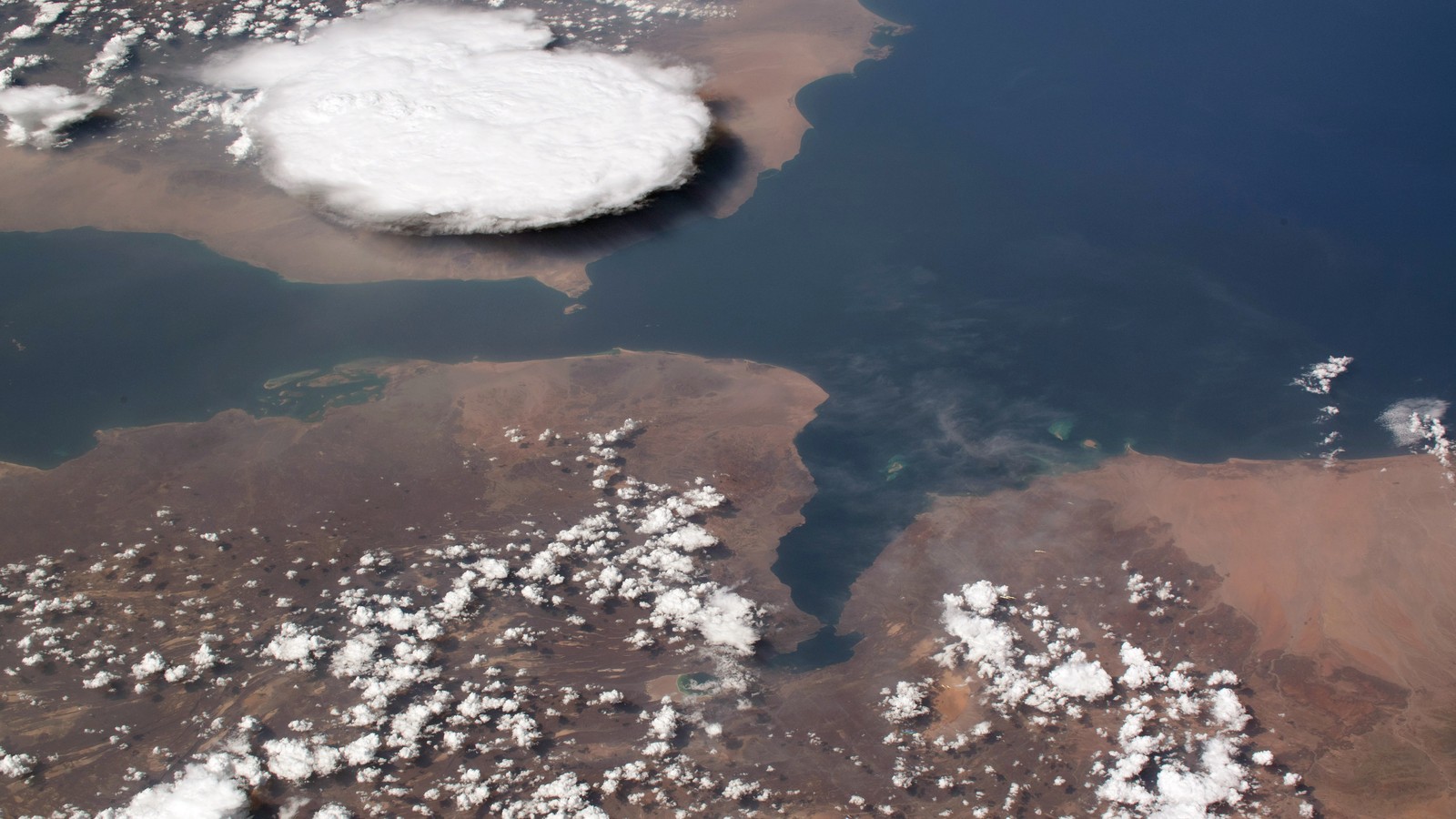 Storm clouds over the southwestern coast of Yemen near the Bab al-Mandab Strait.