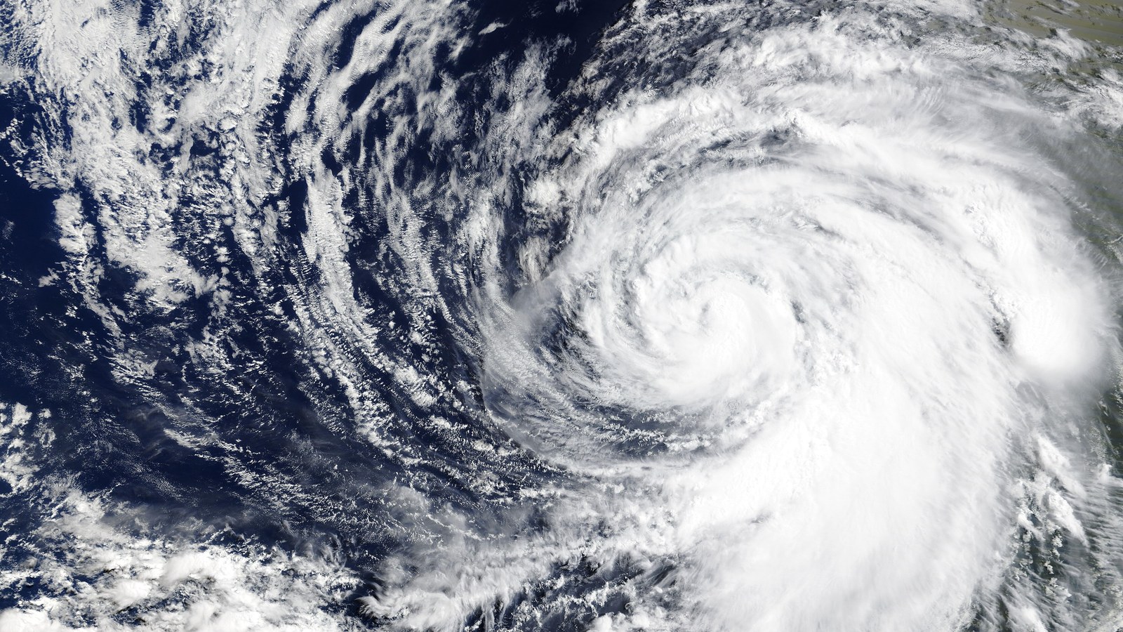 Satellite view of a spiralling hurricane over the Pacific Ocean
