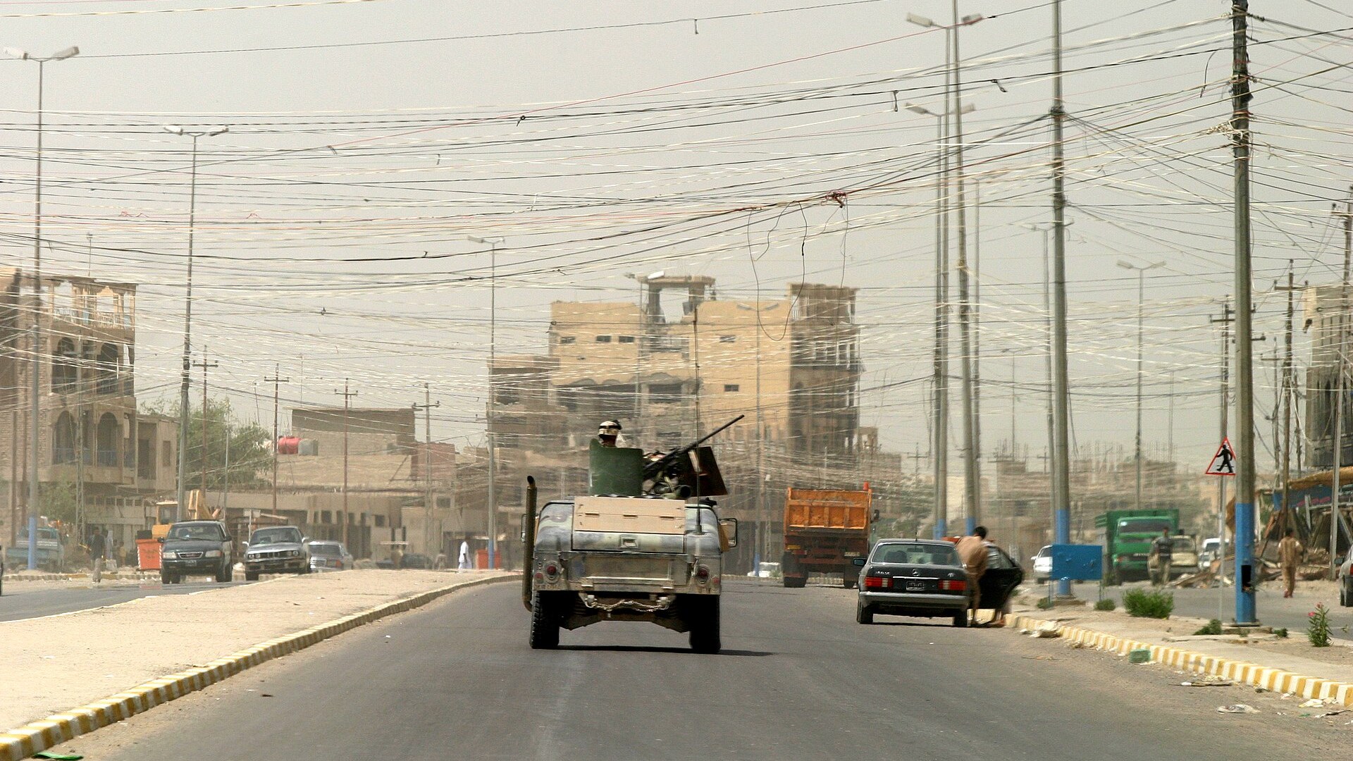United States military personnel and vehicles during a previous deployment in Iraq
