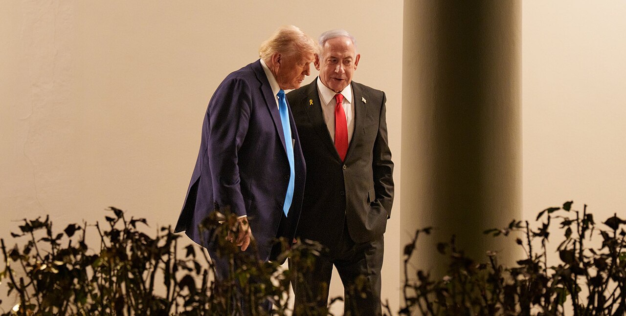 Donald Trump and Benjamin Netanyahu walking together at the White House in February 2025.