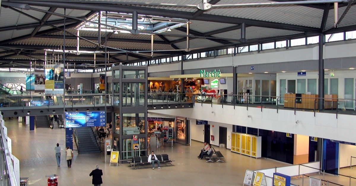 Aerial view of Leipzig/Halle Airport showing runways, terminals and surrounding infrastructure.