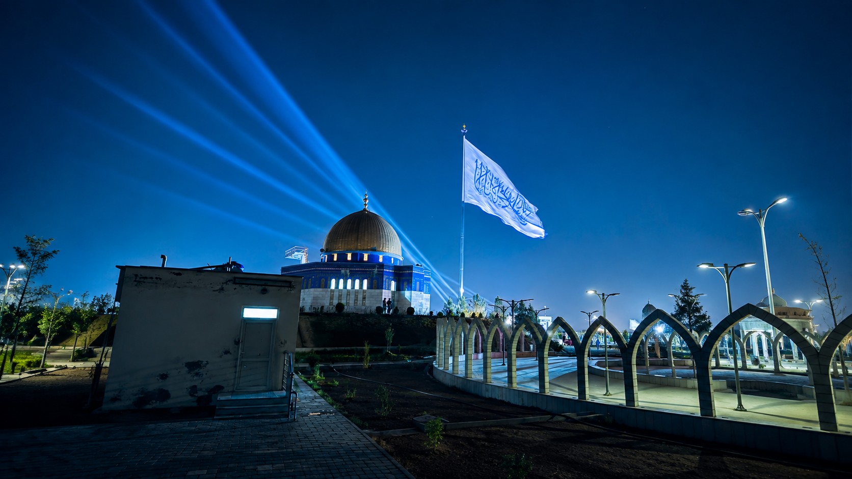 AI-generated illustration of a mosque and Kabul neighbourhood at night.