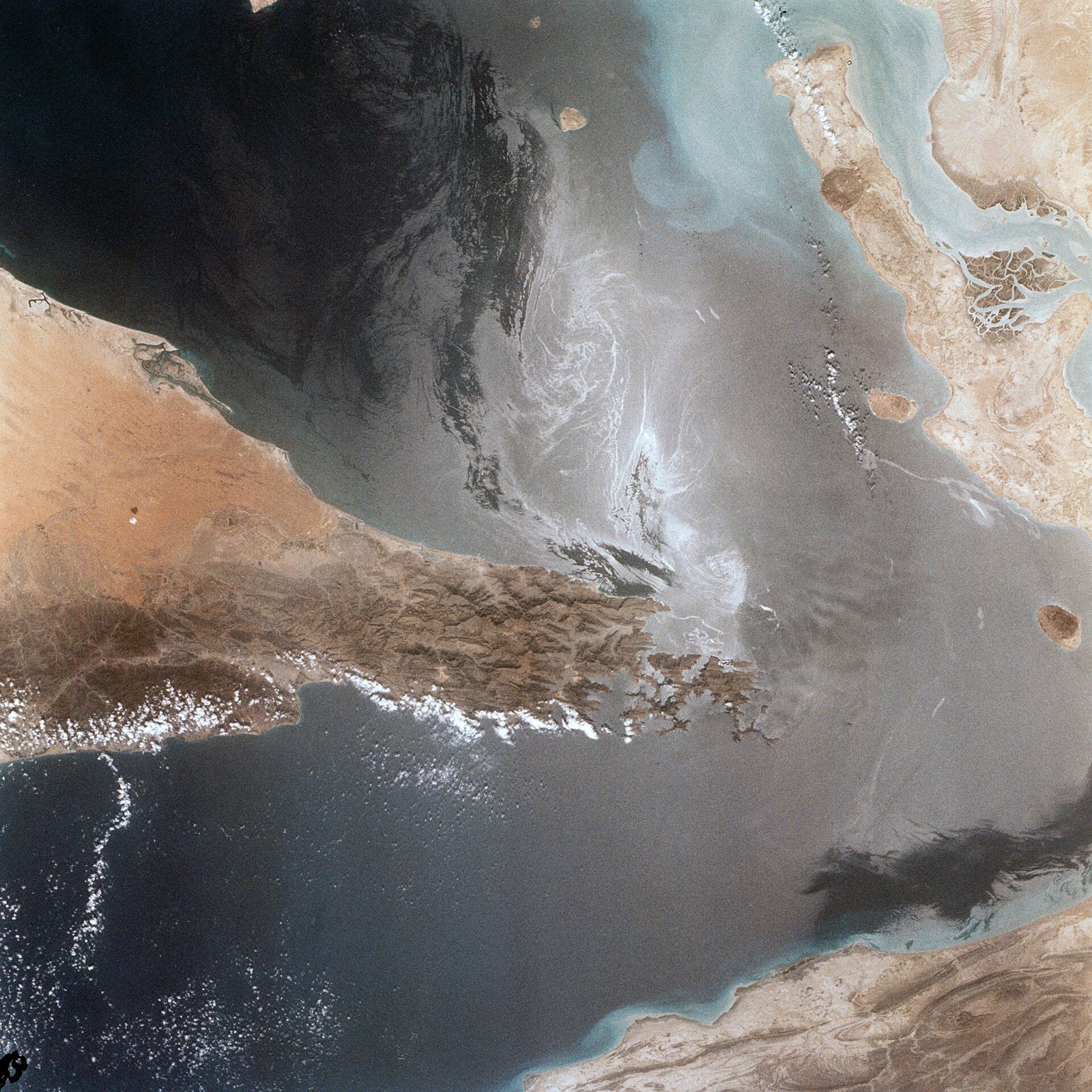 Aerial view of the Strait of Hormuz with Iran, Oman and the United Arab Emirates visible